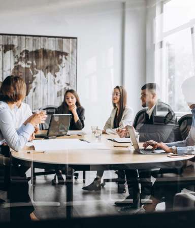 Group of people working out business plan in an office
